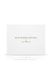 Microblading Phi Box kit with premium pigments, ergonomic tools, and practice materials for professional-quality eyebrow microblading.