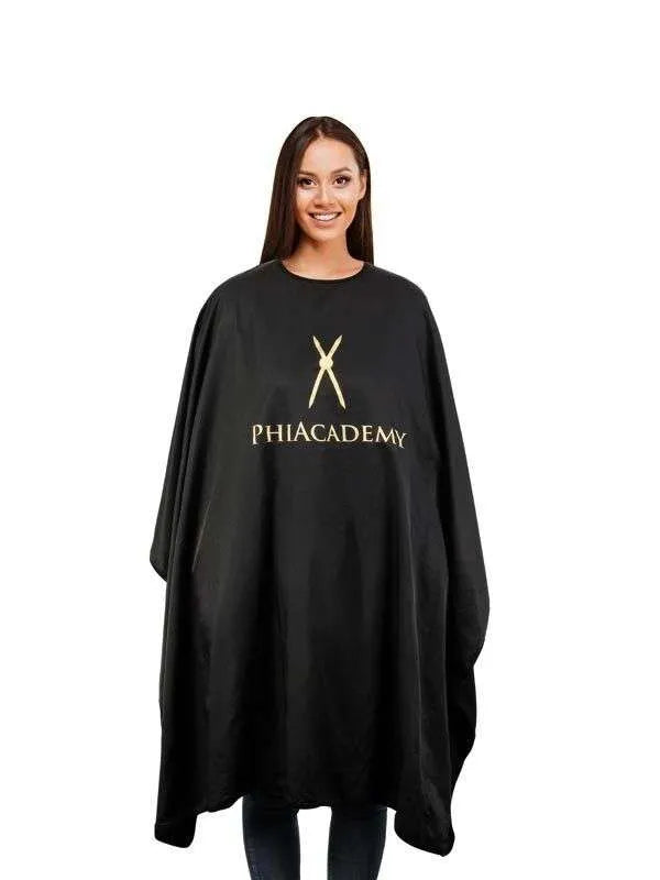 Phi Cosmetic Cape with PhiAcademy Logo in black and gold, offering full protection and a professional look during cosmetic treatments